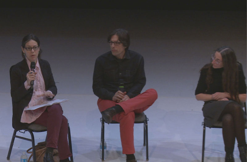 Annie B. Parson with mic in hand talks alongside Bruce Baird and Yelena Gluzm following the film